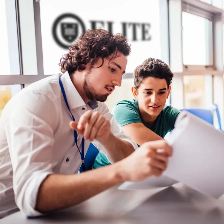 Mentor working one-on-one with a student